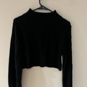 Cropped black mock neck knit sweater
